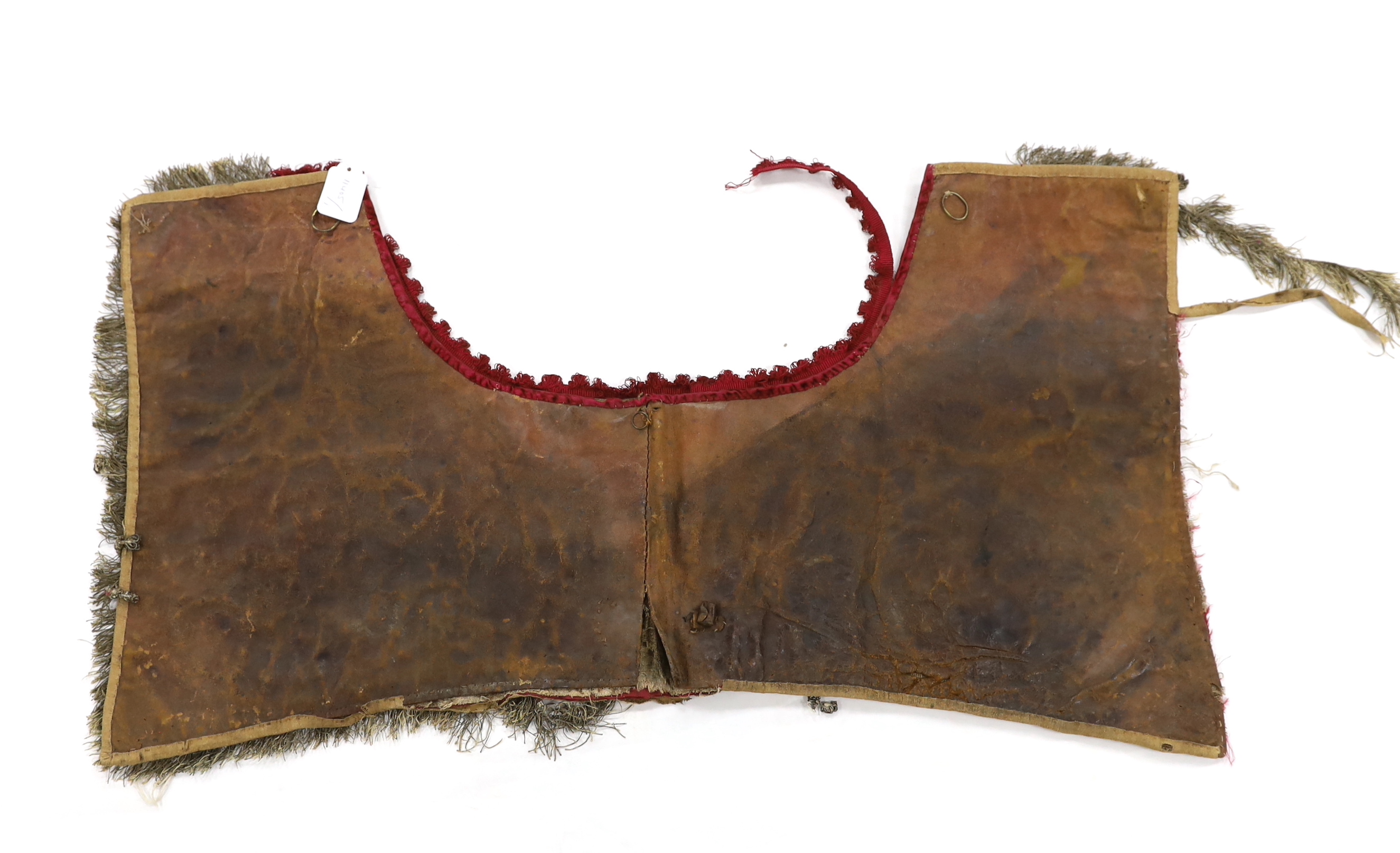 A burgundy velvet and silver thread embroidered and fringed saddle blanket, possibly Italian or Spanish, circa late 18th century, 94cm long x 50cm deep